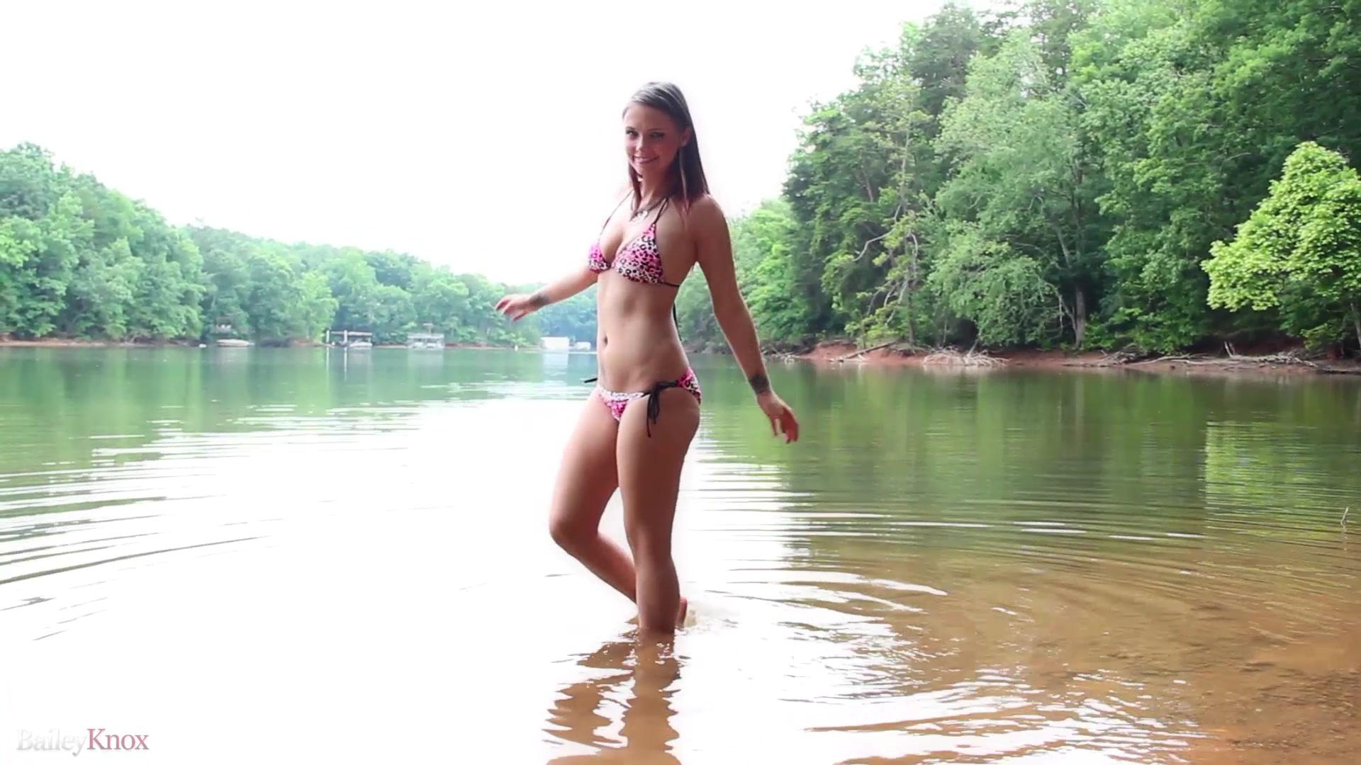 Sexy Miss Knox dipping her feet in the beautiful lake