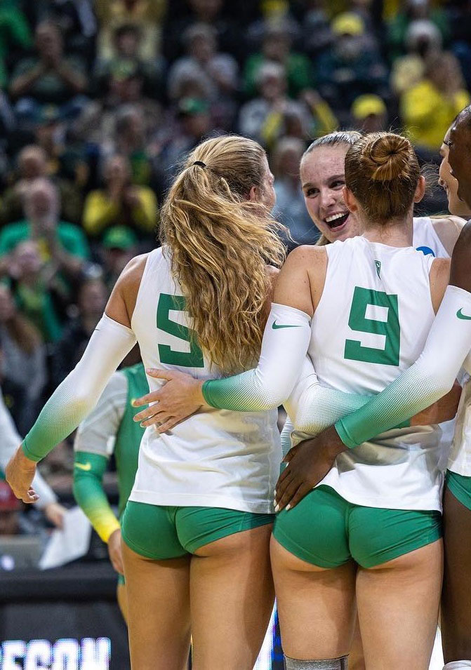 Volleyball team in tight green shorts